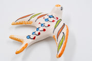 Oiseau en céramique artisanale – Symbole de liberté et de beauté tunisienne