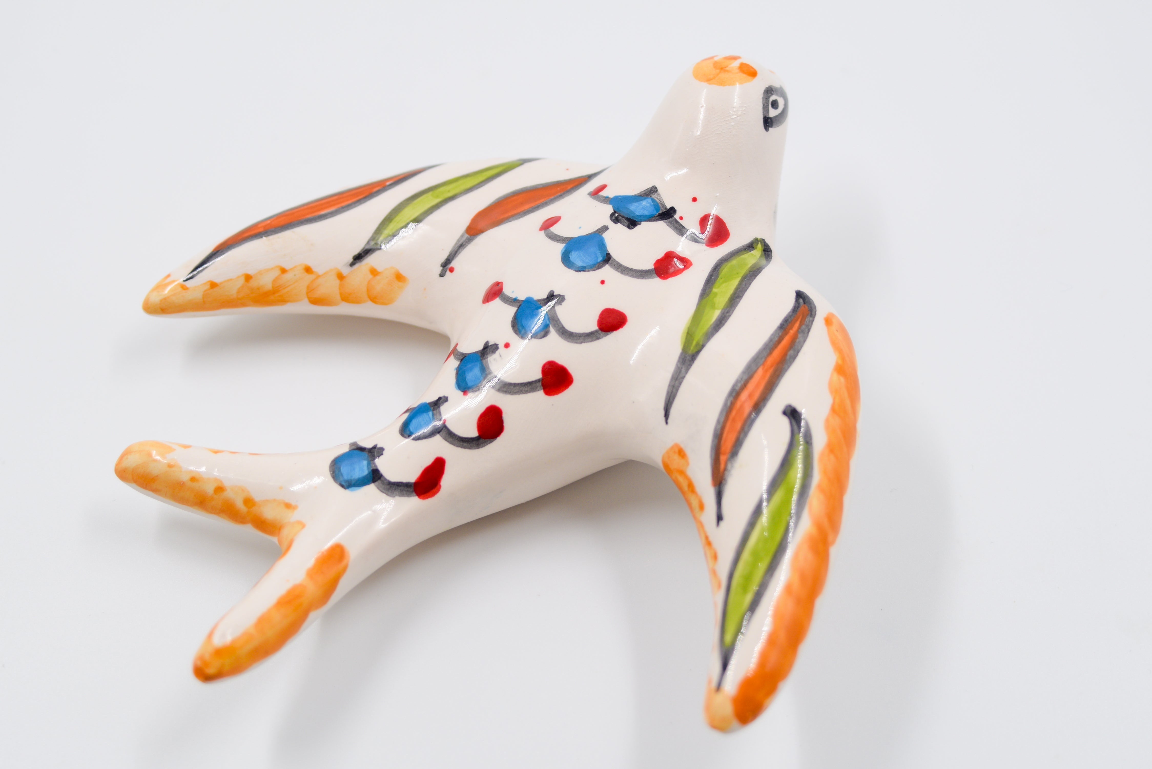 Oiseau en céramique artisanale – Symbole de liberté et de beauté tunisienne