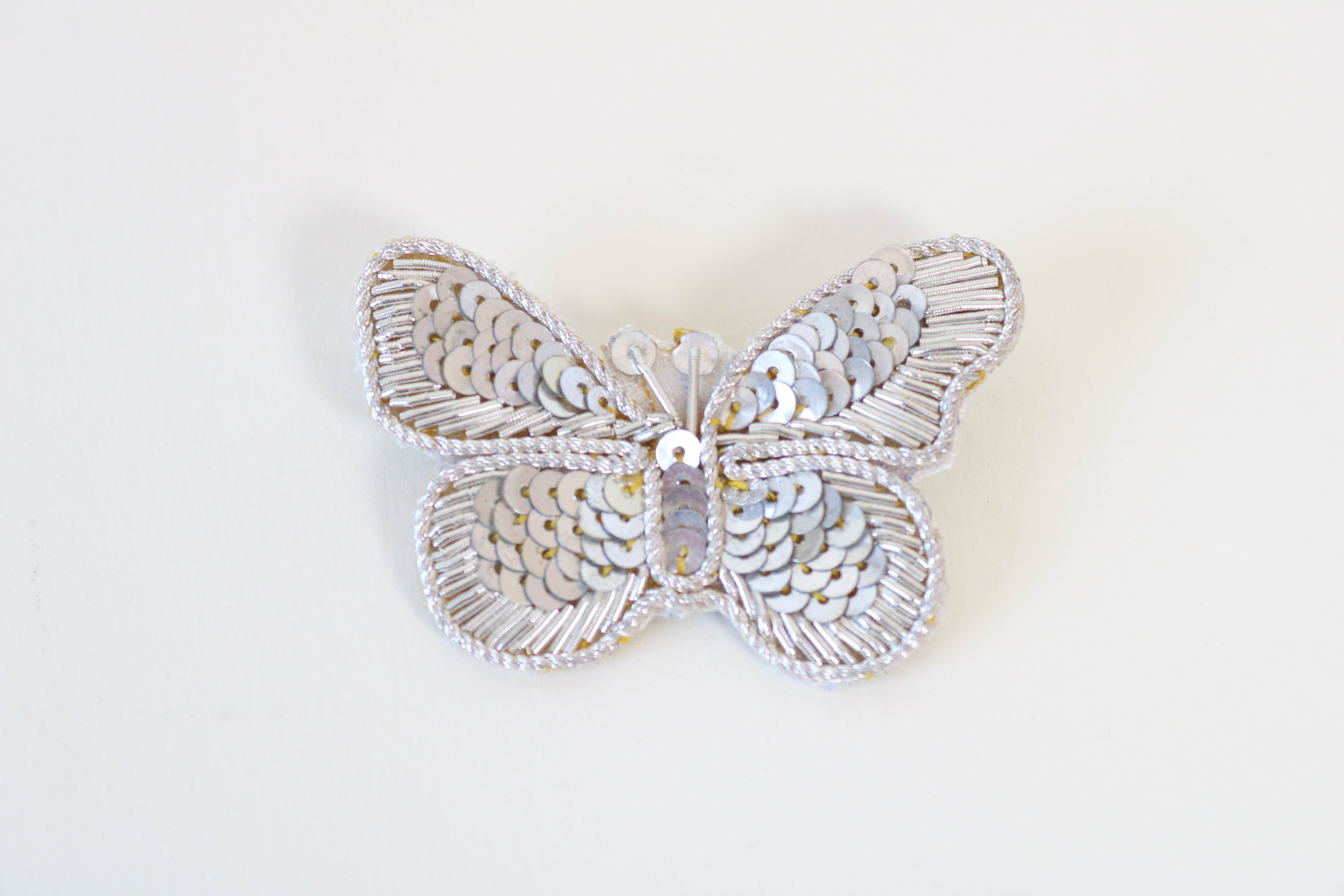 Broche en broderie d'or cannetille