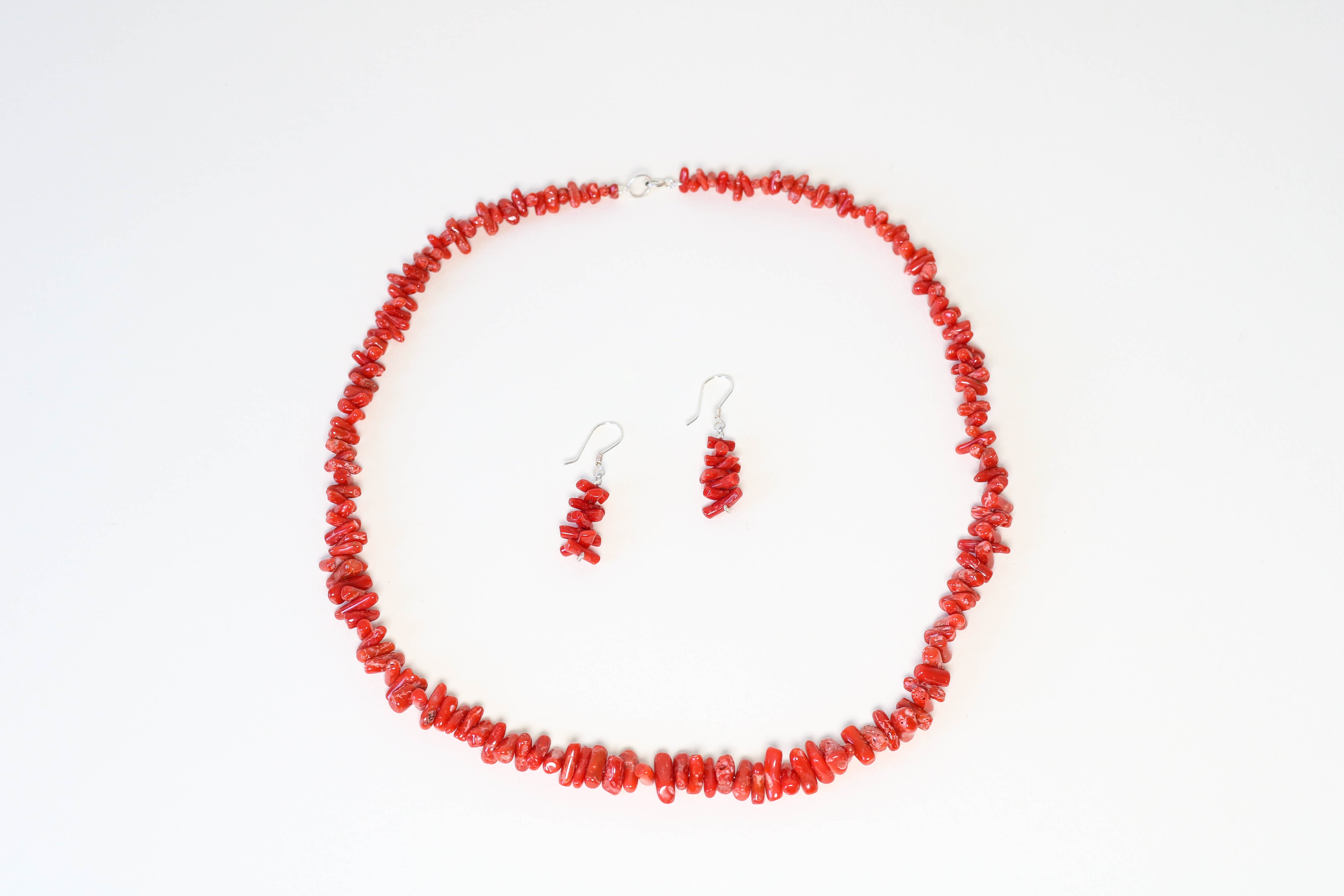 Bracelet et boucle d'oreille en corail