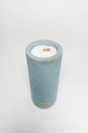 Bougie parfume avec un bol en beton bleu