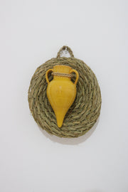 decoration murale en alfa avec un petit pot